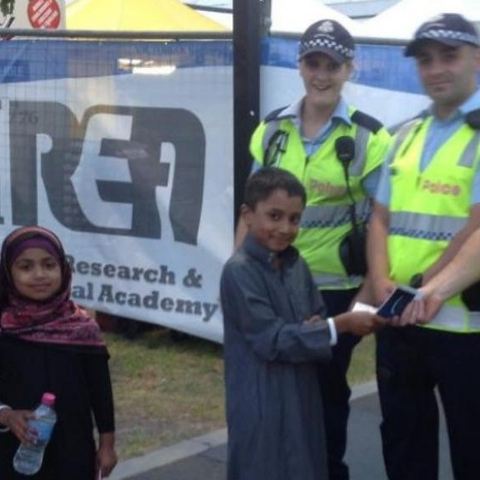 A student sharing the message of Islam with police officers